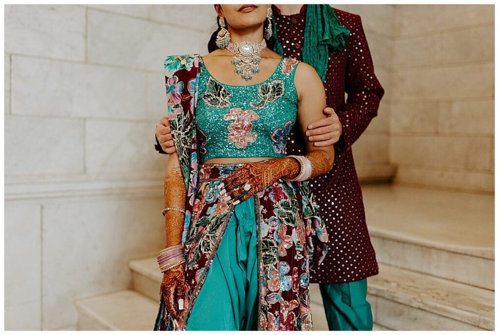 Aarushi in her Indian fusion bridal outfit on the marble staircase at the Lumber Exchange Minneapolis
