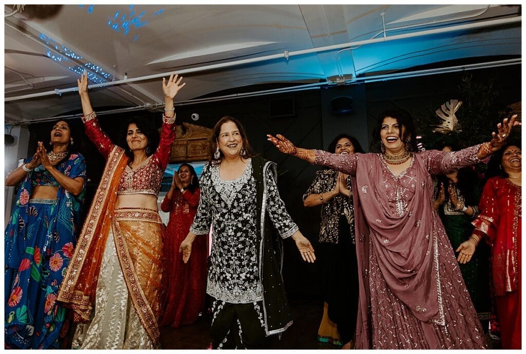 Guest performing a dance at the sangeet during Aarushi and Shane's Minneapolis Indian wedding weekend