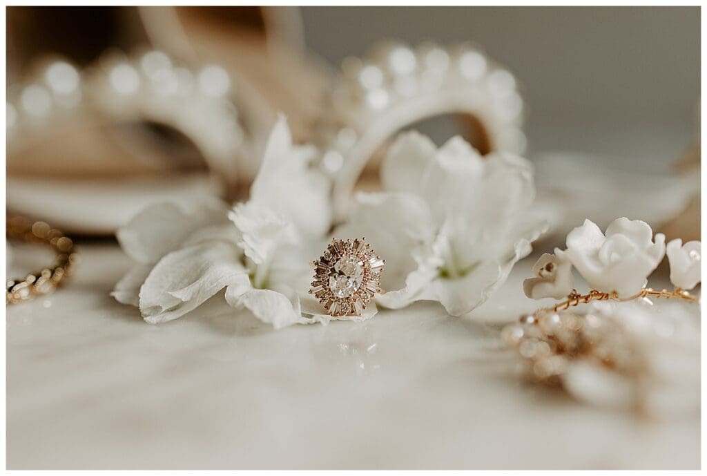 Bridal accessories and floral detail flat lay from Aarushi and Shane's Minneapolis Indian fusion wedding
