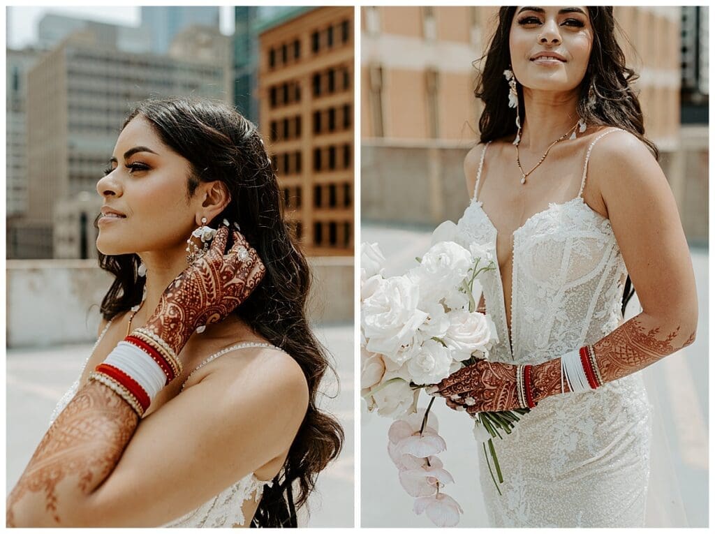 Aarushi in her white wedding gown holding her bouquet on the rooftop of the Lumber Exchange Minneapolis