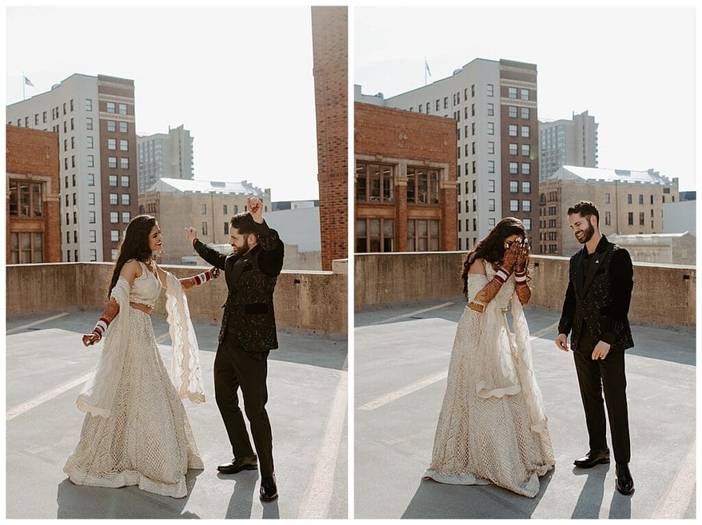 Aarushi and Shane dancing and laughing together on the rooftop of the Lumber Exchange in Minneapolis