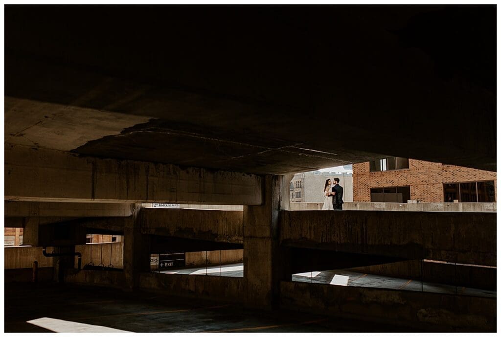 Aarushi and Shane silhouette portrait on the rooftop of the Lumber Exchange at dusk in Minneapolis