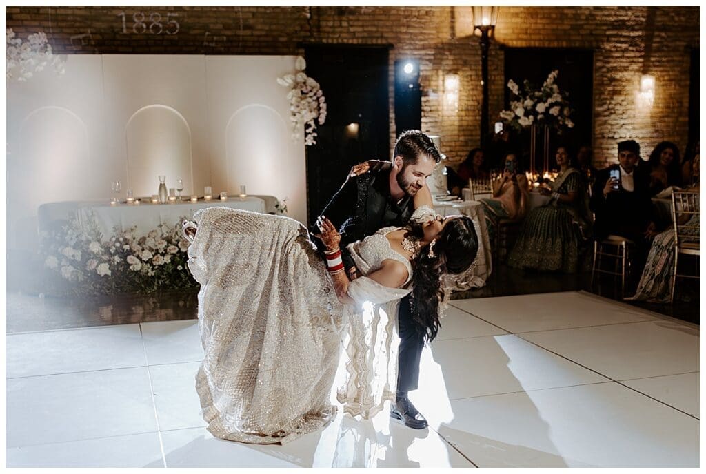Aarushi and Shane first dance at their Indian fusion wedding reception at the Lumber Exchange Minneapolis