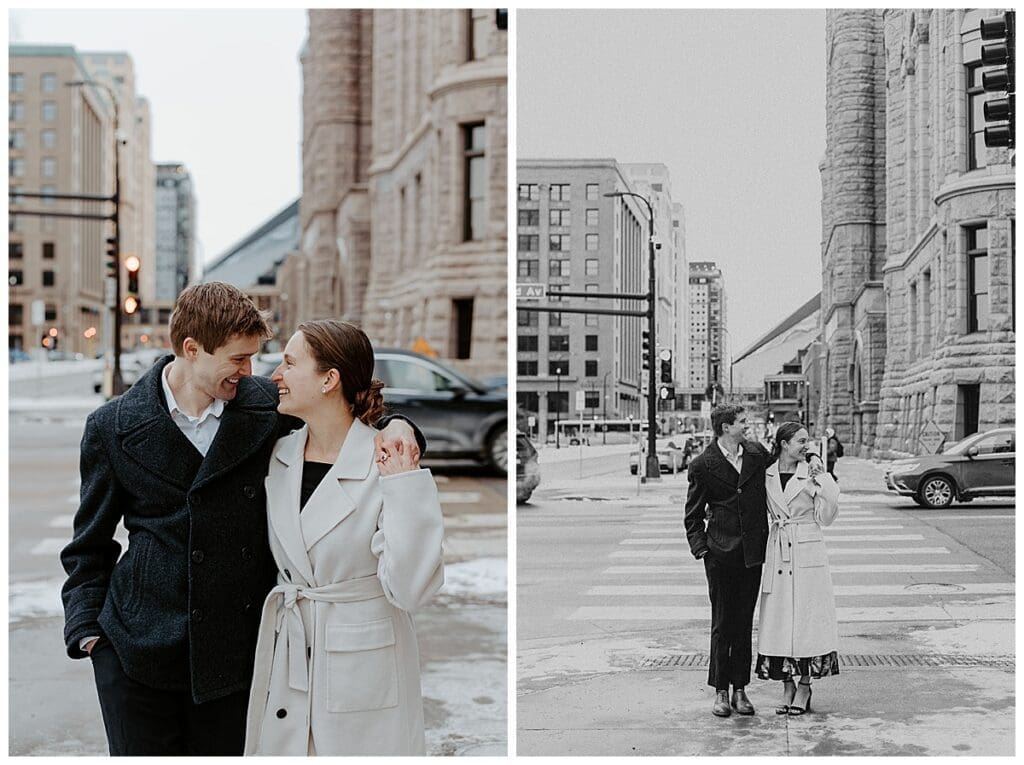 Meredith and Alec walking through the streets of downtown Minneapolis during their winter engagement session