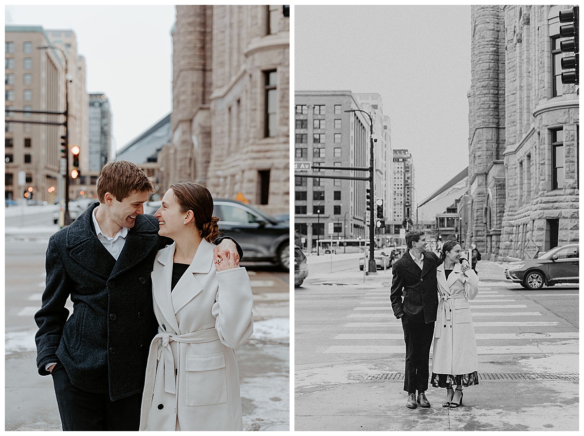 Meredith and Alec walking through the streets of downtown Minneapolis during their winter engagement session