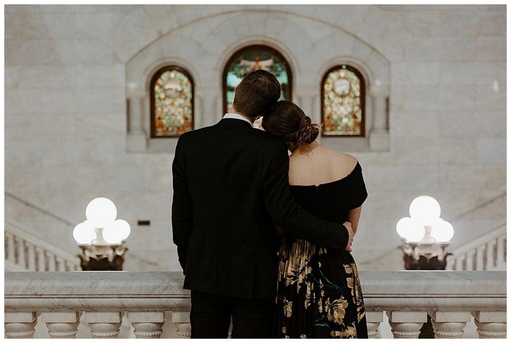 Meredith and Alec portrait inside the ornate interior of Minneapolis City Hal